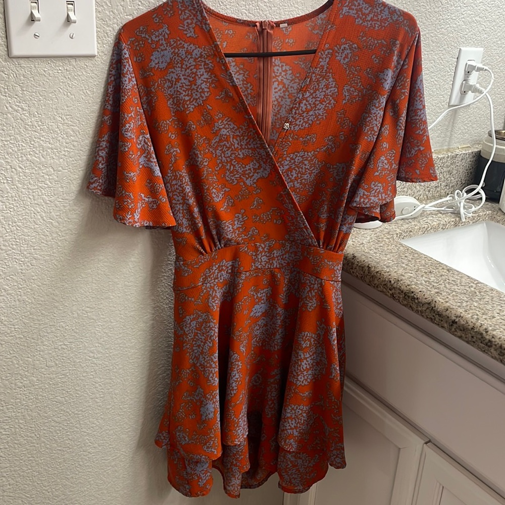 Relipop floral romper Size M. Only worn once!